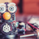 Callbox guest post image of a Furby toy disassembled electronic parts.